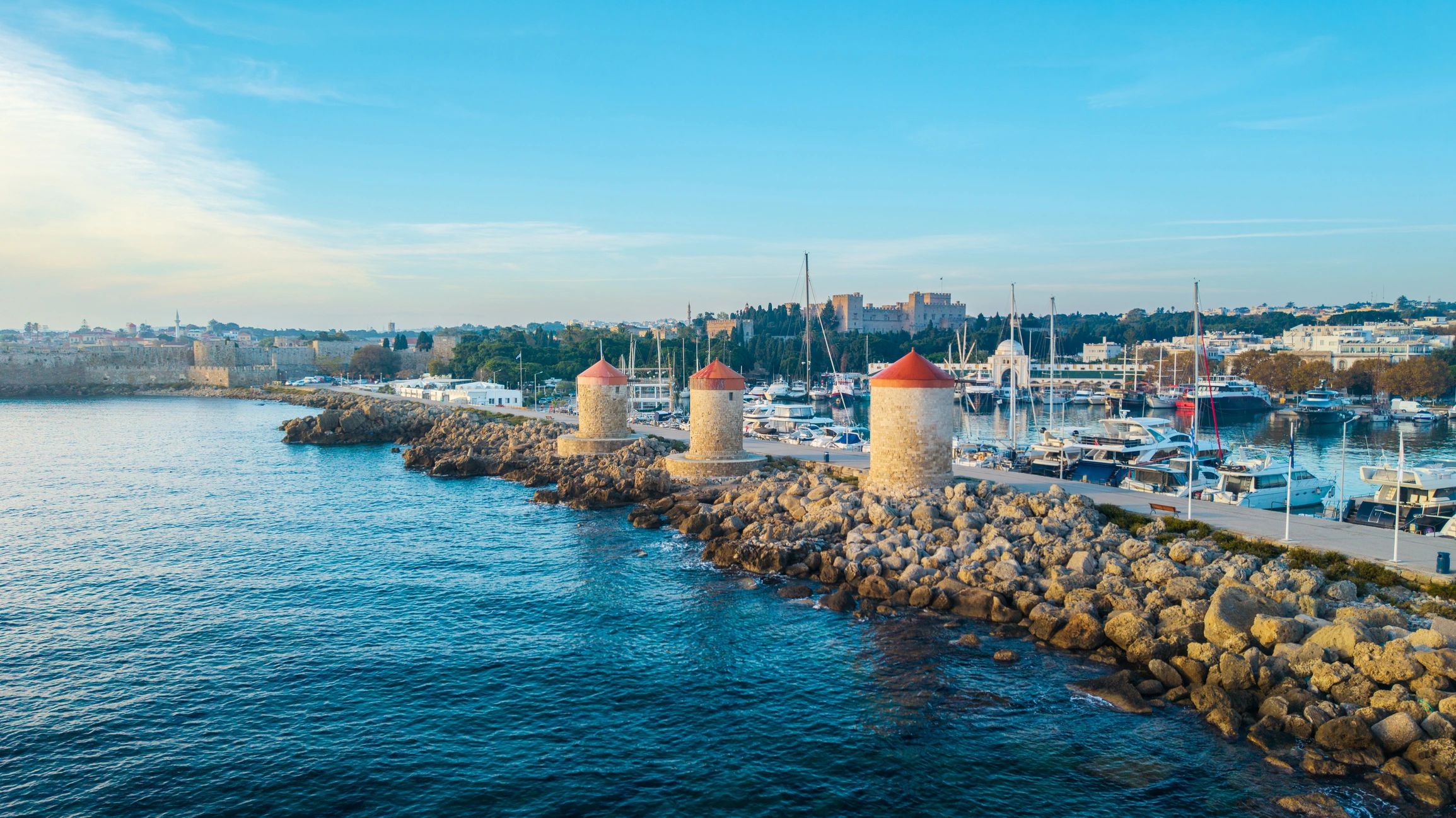 Windmills at Mandraki Harbour in Rhodes, Greece