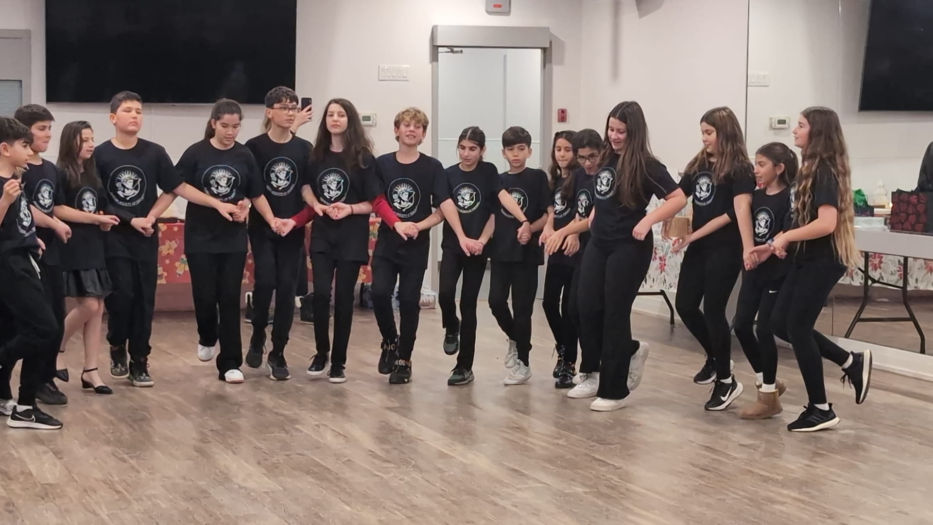 Youth dancers performing a traditional Greek dance