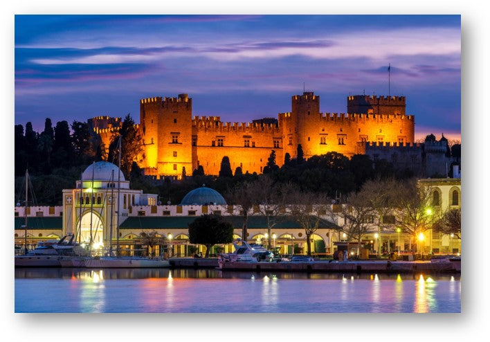 Illuminated Rhodes castle and marina at dusk